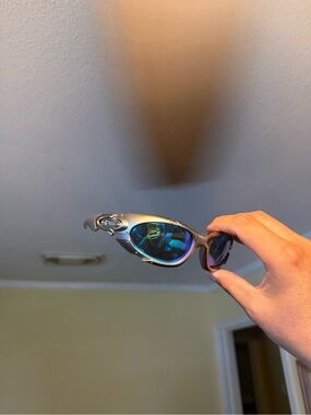 Oakley Titanium Frame Sunglasses with Blue Mirrored Lenses Oakleys